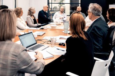 het medTzorg-team aan de vergadertafel