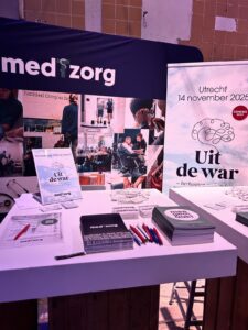 een foto van de stand van medTzorg tijdens de LHV Startersdag met banners en statafel